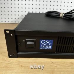 Amplificateur de puissance professionnel QSC CX1202V 1200W 70V monté en rack avec cordon d'alimentation