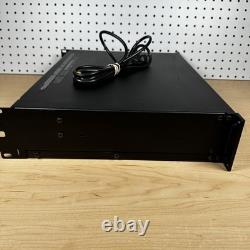 Amplificateur de puissance professionnel QSC CX1202V 1200W 70V monté en rack avec cordon d'alimentation