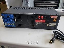 Amplificateur de puissance stéréo professionnel QSC modèle 1200 testé et fonctionnel.